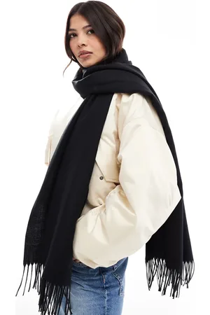 Pieces® Staple tassel scarf in