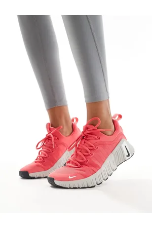Nike Free Metcon 6 sneakers in pink and
