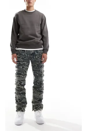 Liquor N Poker Frayed stacked denim jean in stone wash