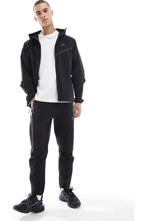 Nike Tech Woven tapered pants in