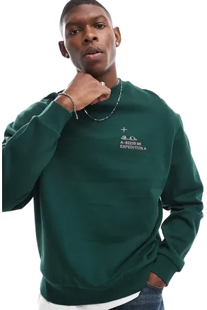 ASOS Oversized sweatshirt with chest embroidery and mountain back print in dark