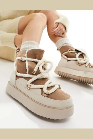ASOS Alpine faux shearling lace up snow boots in off