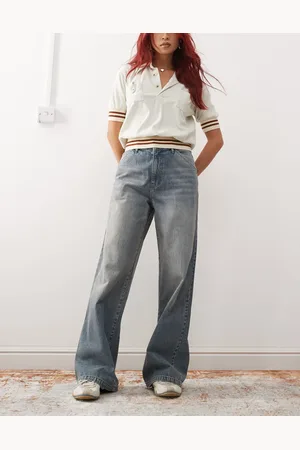 Reclaimed Baggy leg mid rise jean with embroidered pockets in washed