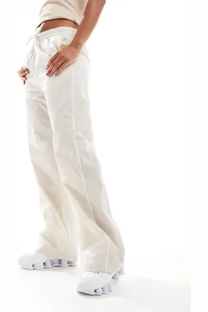 Nike Windrunner track pants in cream