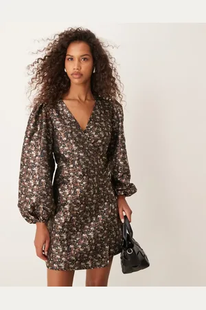 Glamorous V neck balloon sleeve mini dress with front wrap in 70s floral