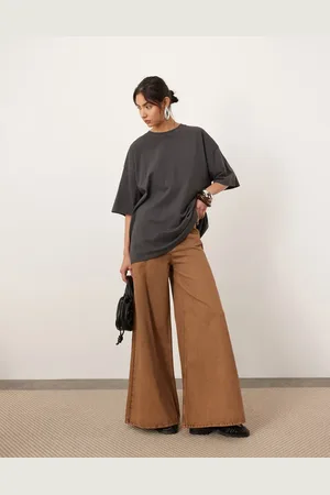 ASOS Reece denim high rise wide leg jeans in rust acid wash