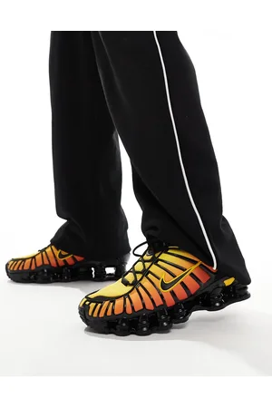 Nike Shox TL sneakers in and red
