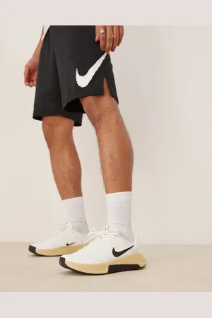 Nike MC Trainer 3 sneakers in off- and black