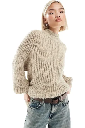 Monki High neck chunky rib knitted sweater with volume sleeve in beige