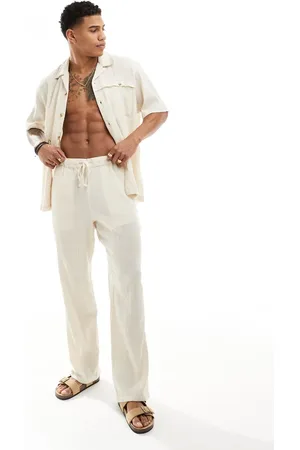 ASOS Baggy crinkle beach pants with elastic waist in stone - part of a set