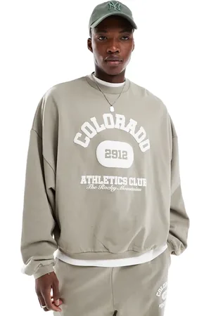 ASOS Extreme oversized sweatshirt with vintage varsity puff print in stone