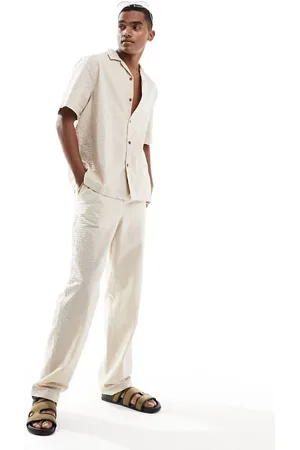 ASOS Baggy seersucker beach pants with elastic waist in stone - part of a set