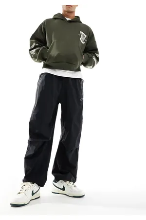 Nike Tech Woven oversized pants in