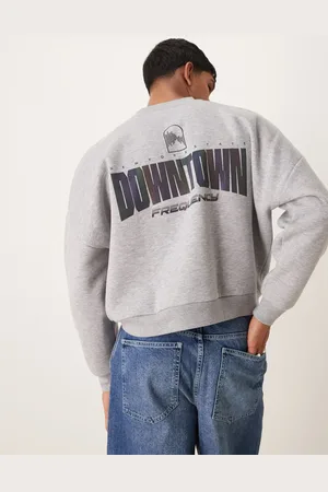 ASOS Oversized dropped shoulder sweatshirt with reflective print in beige