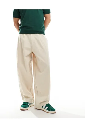 ASOS Baggy balloon cord pant with pleats in cream