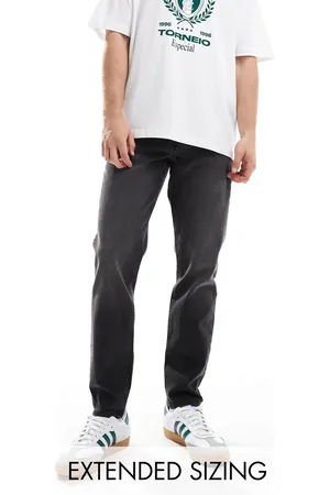 ASOS Tapered jeans in washed with tint