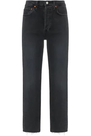 RE/DONE Jeans con tobillos deshilachados