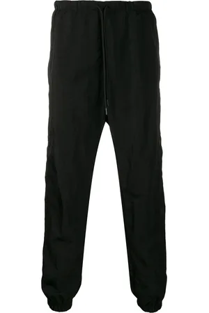 MARCELO BURLON Pants holgados
