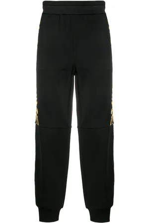 VERSACE Pants con logo Barocco
