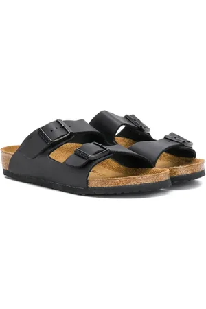 Birkenstock Mules con correa y hebilla