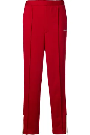 AMBUSH Pants con rayas laterales