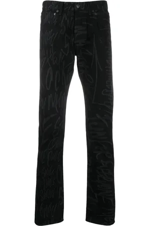 Takahiromiyashita The Soloist Pantalones con estampado de graffiti