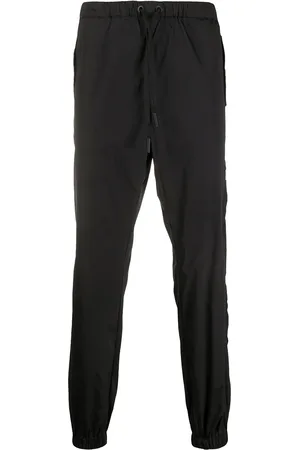 MARCELO BURLON Pants tapered Cross