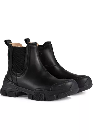 Gucci Botines con parche del logo
