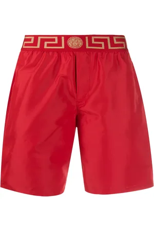 VERSACE Shorts de playa con motivo Greca