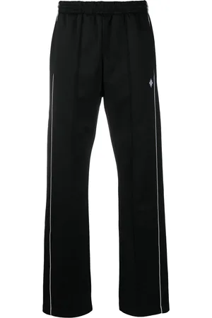 MARCELO BURLON Pants Cross