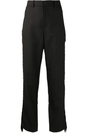 DION LEE Pantalones con detalle de flecos