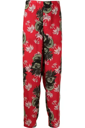 UNDERCOVER Pantalones con palmeras estampadas