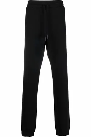MARCELO BURLON Pants estampados
