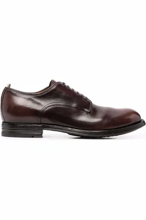 Officine creative Zapatos pulidos
