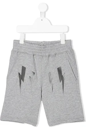 Neil Barrett Bermudas joggers con estampado
