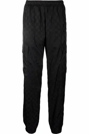 MISBHV Pantalones con monograma estampado