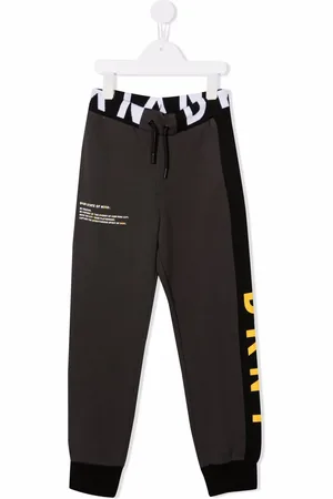 DKNY Pants con franjas del logo