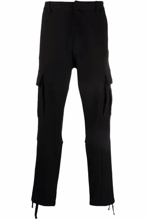 MARCELO BURLON Pants con bordado Cross