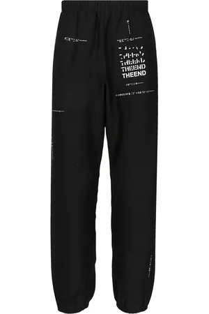 Takahiromiyashita The Soloist Pants con eslogan estampado