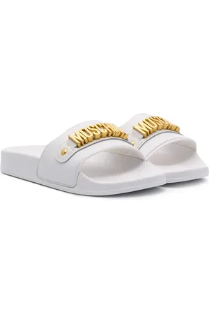 Moschino Sandalias planas con detalle de lazo