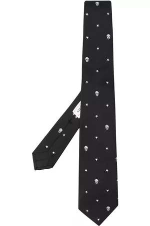 Alexander McQueen Corbata con calaveras y estrellas estampadas