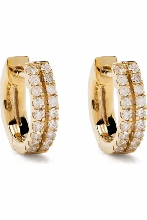 DJULA Aretes huggie en oro amarillo de 18kt con diamantes