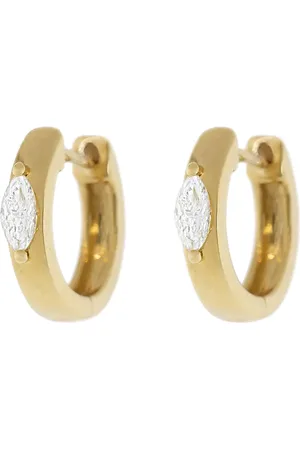 Anita Aretes huggies en oro amarillo de 18kt con diamantes