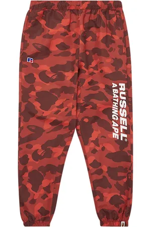 A Bathing Ape Pants con motivo militar de x Russell