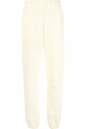 ROTATE Pants con elástico en tobillos