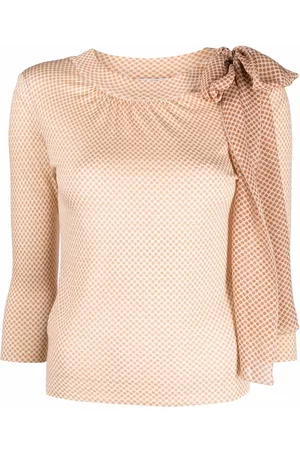 Dior Blusa con estampado de lunares y lazo 2010