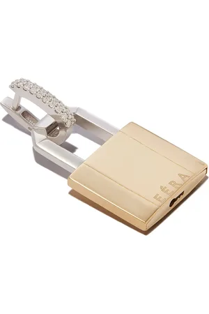 Eera Arete Lock grande en oro amarillo y blanco de 18kt con diamantes