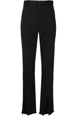 DION LEE Pantalones con abertura frontal