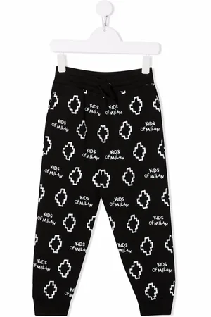 MARCELO BURLON Pants con logo estampado
