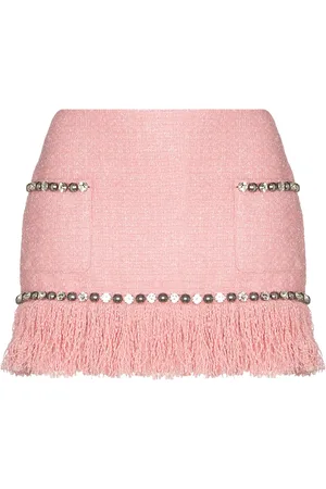 AREA Falda corta con flecos